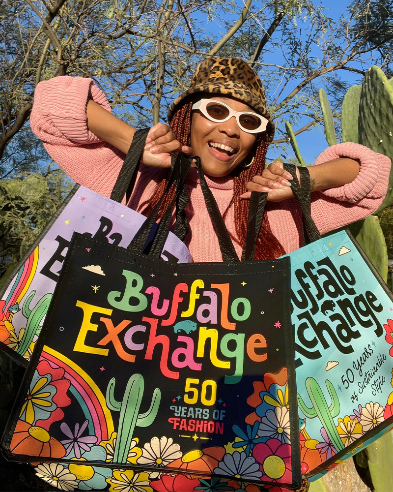 Image of a person holding the Buffalo tote bags