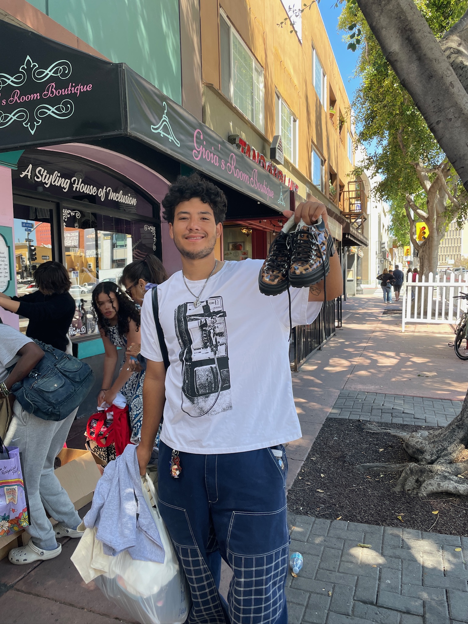 Customer showing off a tee they found for a dollar